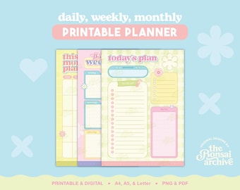 May include: A set of daily, weekly, and monthly printable planner pages featuring a pastel color palette of yellow, pink, and blue. The pages include sections for reminders, to-do lists, and notes, with floral accents and the text "today's plan".