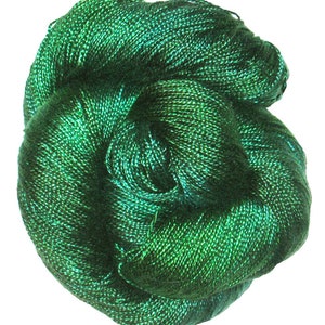 May include: A skein of emerald green metallic yarn.