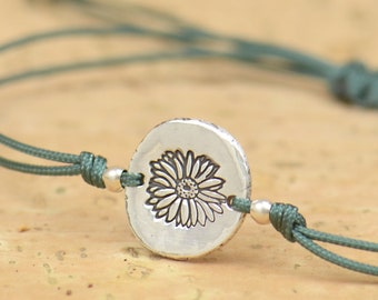 Pulsera flor margarita en plata