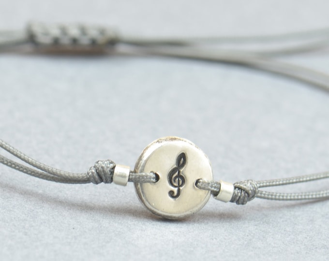 Sterling silver tiny music note charm bracelet