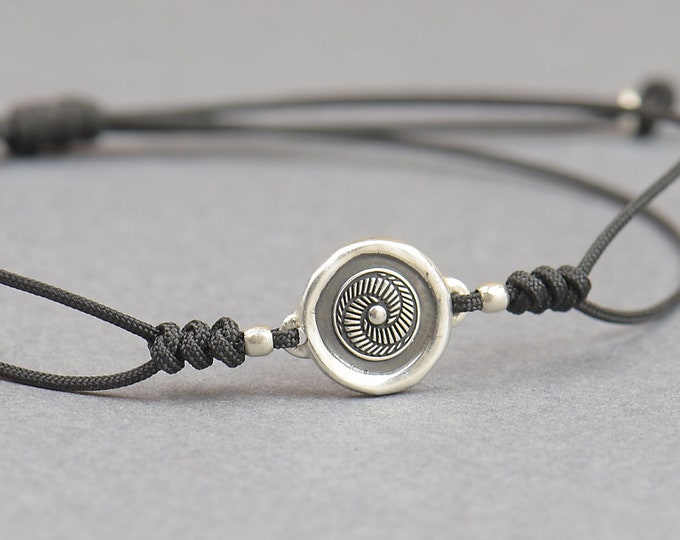 Spiral charm bracelet