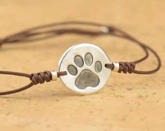 Sterling silver tiny paw print bracelet.Paw lovers, bear lovers, paw print bracelet.Tiny bracelet.