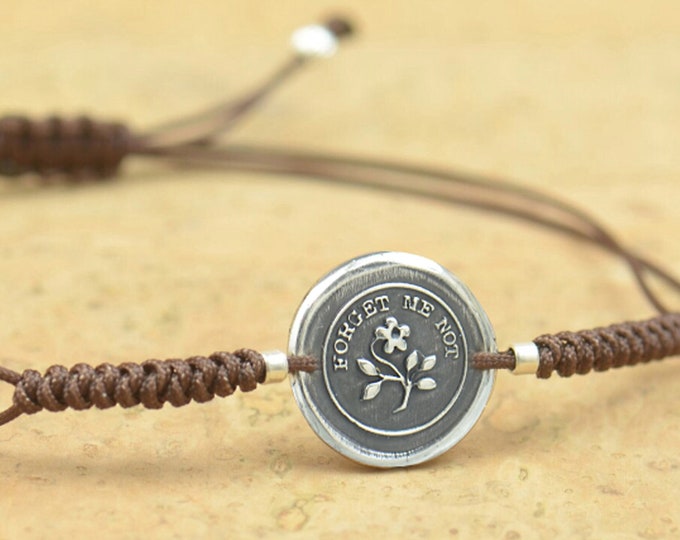 Sterling silver tiny -Forget me not- artisan handmade bead bracelet.Rustic.