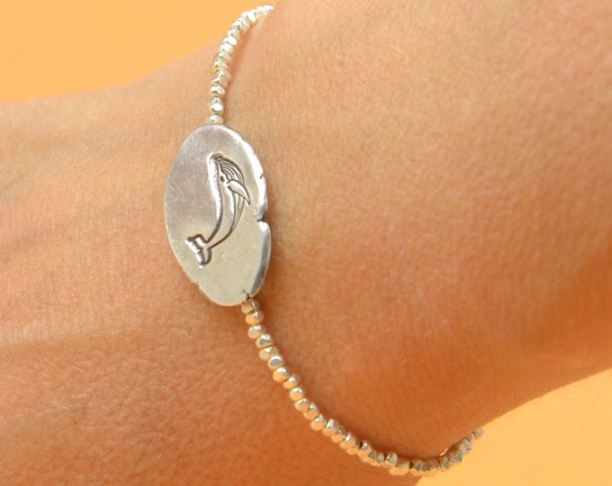 Sterling silver humpback whale and nuggets beads bracelet