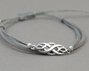 Sterling Silver Celtic Knot charm bracelet. Mens bracelet