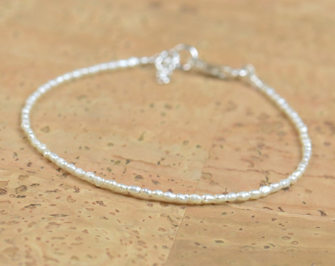 Super tiny white pearls bracelet