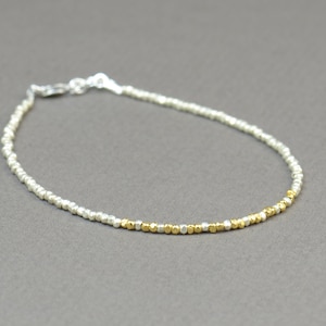 Sterling silver and vermeil gold colors nuggets beads bracelet.Sterling silver clasp