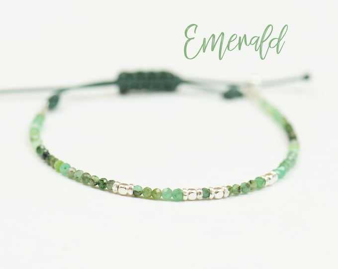 Emerald and sterling silver bracelet.Adjustable knot