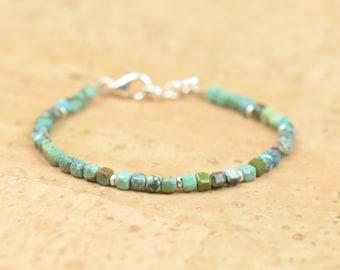 Turquoise cube and sterling silver beads bracelet.Square beads