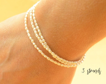 Super tiny white pearls bracelet.Triple Double or single wrap bracelet