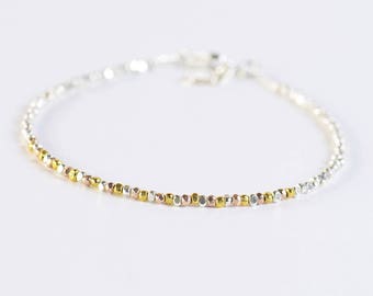 Sterling silver 3 gold colors nuggets beads bracelet.Sterling silver clasp