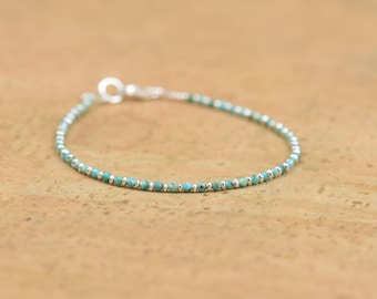 Tiny turquoise and sterling silver beads  bracelet.