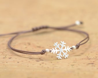 Sterling silver snowflake charm bracelet-Sterling silver.
