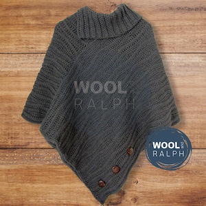 May include: Gray knitted poncho with a turtleneck collar and wooden buttons. The poncho has the text "WOOL RALPH" on the front.