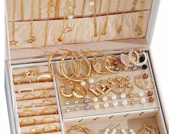 Un conjunto de 86 piezas de joyería elegantes y de moda para mujer, incluido un collar.