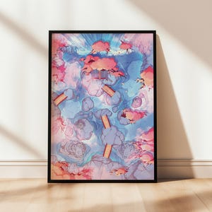 May include: Framed art print with an abstract landscape in pink, blue, and orange. The artwork shows floating islands and bridges, in a black frame. The print is displayed on a wooden floor against a white wall.