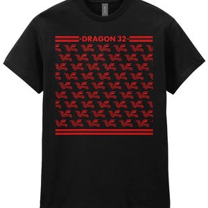 May include: Black t-shirt featuring a repeating pattern of the Dragon 32 logo in red. The logo is a stylised dragon with wings and a tail.