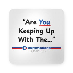 May include: Square white sticker with the text "Are You Keeping Up With The..." in black. The word "You" is in blue with a red underline. The Commodore Computer logo is at the bottom.