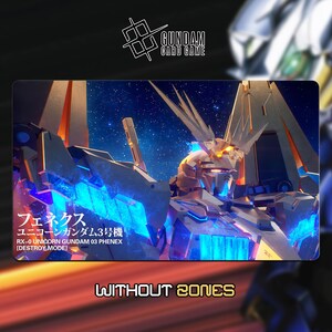 May include: A Gundam card game playmat featuring a detailed illustration of the RX-0 Unicorn Gundam 03 Phenex in Destroy Mode. The design incorporates blue, gold, and white hues, with Japanese text and the words "WITHOUT ZONES".