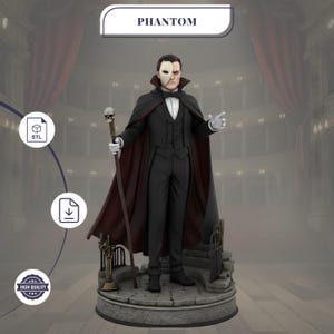 May include: A figurine of the Phantom from the musical, wearing a black suit, cape, and half-mask. He holds a cane with a skull on top and stands on a stone base. The word "PHANTOM" is displayed above the figure.