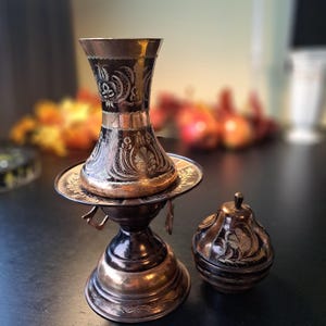 Vasi/bruciaincenso mediorientali in rame.