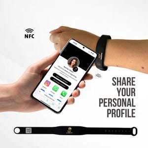 May include: A black wristband with a gold logo and a QR code. The wristband is being used to share a digital profile with a smartphone. The text "SHARE YOUR PERSONAL PROFILE" is displayed on the image.