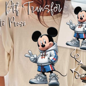 May include: DTF Transfer, Ready to Press. Cartoon image of Mickey Mouse wearing a white hoodie, blue shorts, and sneakers. Mickey is giving the peace sign. The image is on a white background. A heat press is also shown.