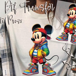 May include: A colorful DTF (Direct to Film) transfer featuring a cartoon mouse wearing a red cap, gold chain, and sneakers. The mouse is dressed in a blue, yellow, and red outfit. The text "DTF Transfer Ready to Press" is visible.