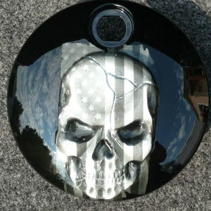 Harley-Davidson touring fuel door with a skull and American flag