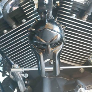 Custom side-mounted horn cover with 3D Gladiator helmet