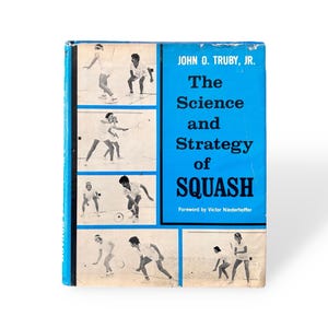 May include: A vintage book titled "The Science and Strategy of Squash" by John O. Truby, Jr. The cover is bright blue with black and white action shots of squash players. The book's title is in large, bold letters.