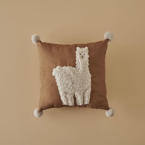 handmade animal stitched cushion