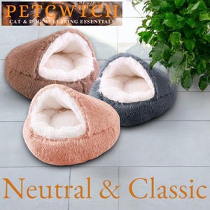 May include: Three pet beds in neutral colors: brown, beige, and gray. The beds are shaped like a rounded oval with a soft, plush lining. The beds are designed with a raised edge and a cozy, cave-like opening for pets to snuggle into.  The text "PETCWITCH CAT & DOG WELLBEING ESSENTIALS" is visible at the top of the image. The text "Neutral & Classic" is visible at the bottom of the image.