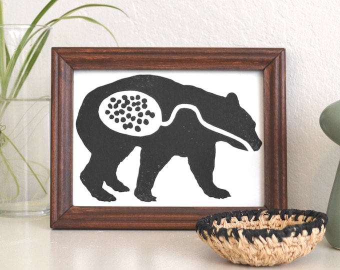 modern rustic cabin art: "bear eats berries," hand-pressed linocut print