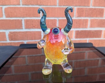 Orange Yellow Sunburst Horned Kooky Monster