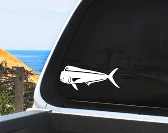 May include: A white silhouette of a mahi-mahi fish decal on a black truck tailgate.