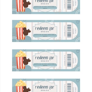 May include: Four light blue snack tickets with the text "redeem for snack" and "good for one: ice cream, cotton candy, or popcorn." Each ticket has a popcorn bucket and a chocolate-covered ice cream bar.