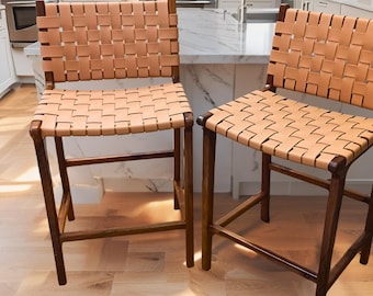 Walnut Counter Stools - Natural Wood With beige Leather Straps.