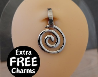 May include: Silver spiral charm pendant for a body piercing. The charm is a circular design with a spiral pattern. The pendant is on a display stand. The text "Extra FREE Charms" is on a black circle sticker.