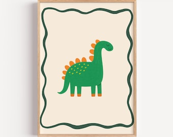 May include: A framed print featuring a green dinosaur with orange accents. The dinosaur has a long neck and a row of orange spikes down its back. The artwork is set against a cream background with a dark green wavy border, all within a wooden frame.