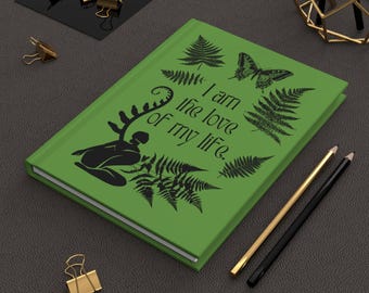 May include: Green journal with a fern and butterfly design. The text on the cover reads "I am the love of my life."