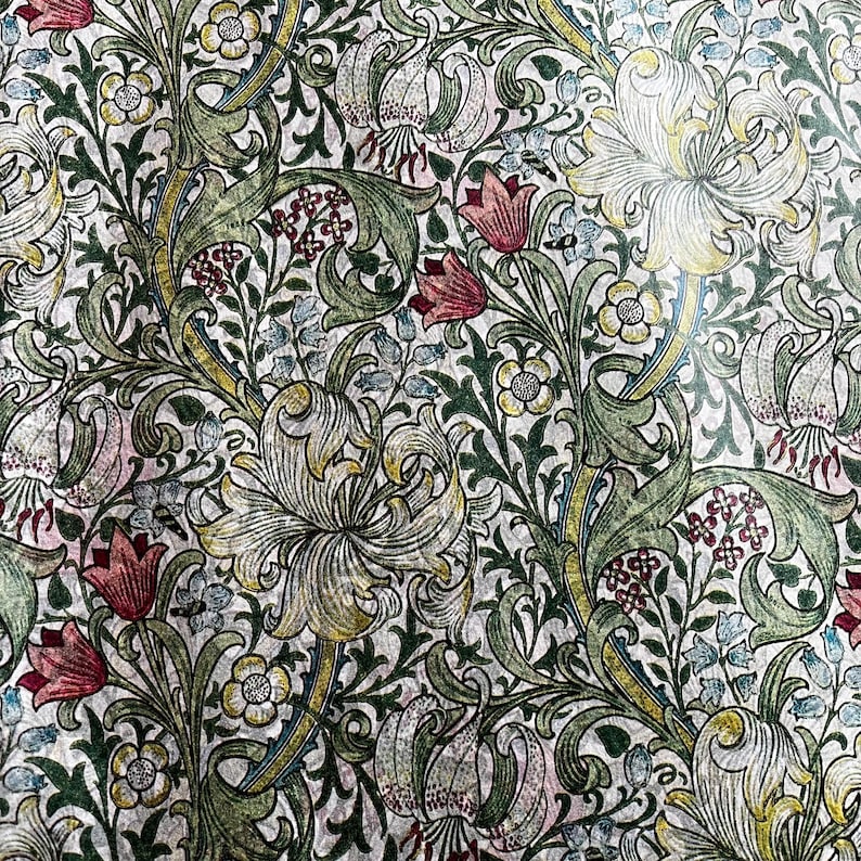 May include: A vintage floral pattern wallpaper with a white background and a repeating design of green leaves, red and white flowers, and yellow and white lilies.
