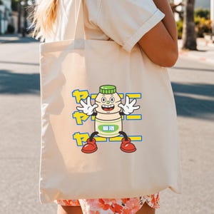 Kawaii Japanese Cartoon Tote Bag: Funny Retro Probiotic Drink Design