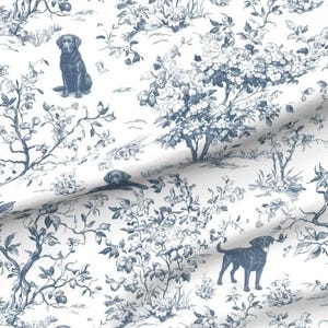 May include: White fabric with a blue toile pattern featuring dogs, trees, and floral elements. The design includes various dog poses, creating a classic and decorative aesthetic. The fabric is suitable for various crafting and home decor projects.