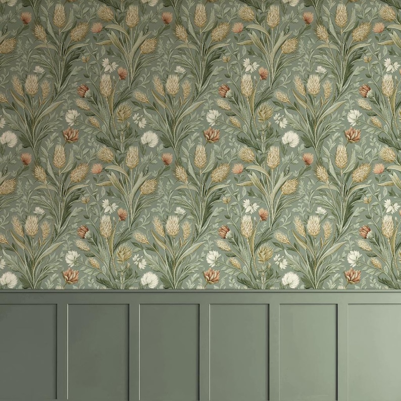 May include: Sage green wallpaper featuring a repeating pattern of wheat stalks, white flowers, and peach accents. The design evokes a vintage botanical print. The lower section of the image displays matching sage green wainscoting.