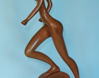 Nude woman wood sculpture RUNNING on WAVES