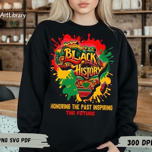 May include: Black sweatshirt with a colorful graphic of an African continent with the text "Black History" and "Honoring the Past Inspiring the Future".