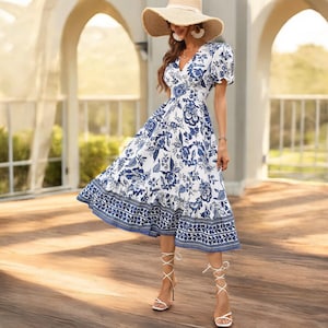 floral short sleeve asymmetrical hem midi dress Floral Short Sleeve Midi Dress
