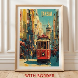 May include: A framed art print featuring a vibrant street scene in Istanbul, Turkey. A red tram is the focal point, traveling down a colorful street with buildings and pedestrians. The word "TAKSIM" is displayed at the top.