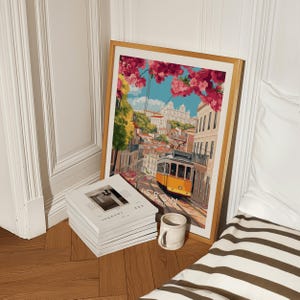 Digital illustration of Lisbon, Portugal, showcasing the iconic yellow tram 28 winding through the flower-lined streets of Alfama. Pink bougainvillea hangs overhead, framing a cobblestone road with traditional buildings on either side. In the background, the São Vicente de Fora church rises above the red rooftops, completing this vibrant, romantic scene of Lisbon’s historic charm and beauty.